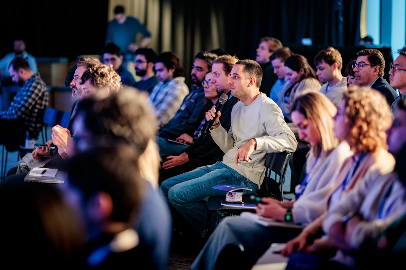 An attendee asking a question